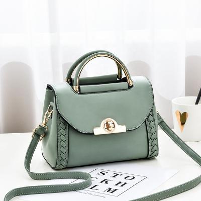 China 2021 wild new high quality fashion ladies handbag lock small woven portable square bag for women for sale