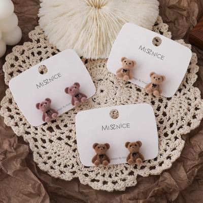 China Japanese cute bow bear flocking earrings and Korean girl earrings cute cartoon fun temperament earrings for sale