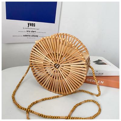 China New Arrival High Quality Retro Mobile Phone Shoulder Bag Personality Woven Hollow Circular Bamboo Evening Clutch Bag For Ladies for sale