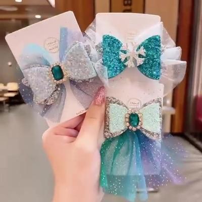 China MSYO Environmentally Friendly Wholesale Kids Accessories Princess Rainbow Gradient Net Yarn Bow Snow Flower Sweet Hair Clip For Baby for sale