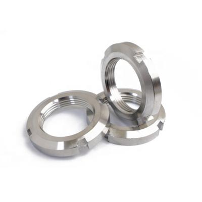 China DIN981 Heavy Industry Standard Steel Round Slotted Shaft Nut , M20~M80 Lock Nuts For Use With Bearings for sale