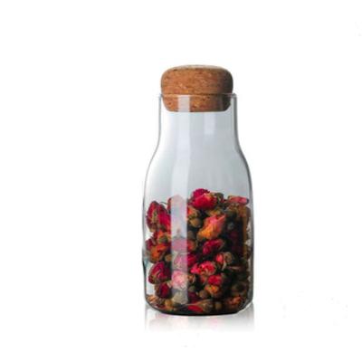 China Sustainable Wholesale Kitchen Food Storage Container Glass Jar With Rooster Lid Clear Glass Bottle for sale