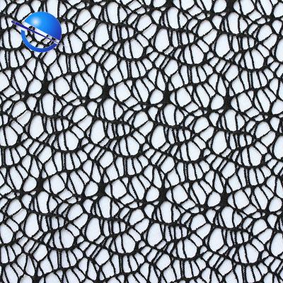 China Solid and load-bearing polyester spandex jacquard irregular hollow net mesh fabric for sale