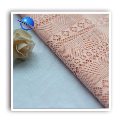 China Fusible 93% Polyester And 7% Spandex Textile Wefts Knitted Jacquard Fabric For Fashion Garments for sale