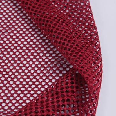 China Waterproof warp raschel polyester knitting elastic mesh fabric for swimwear for sale