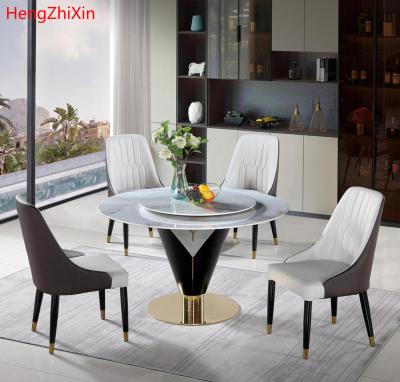 China (Others)Adjustable Italian Luxury Dining Room Furniture Round Modern Simple Fashion Marble Dining Table And Chair Set for sale