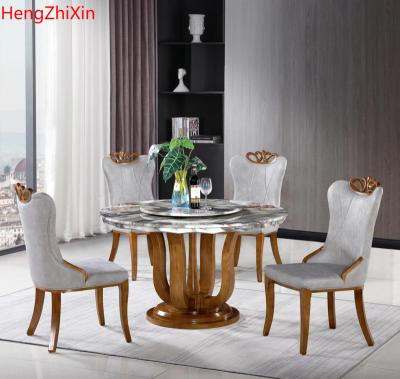 China (Others)Adjustable Modern Luxury Classic Marble Rotating Round Table Dining Room Furniture Set With 6 Chairs Table Set for sale