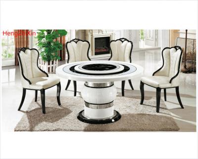 China (Others) Modern Nordic White And Black Marble Leather Chairs Adjustable Round Dining Table Marble Set for sale