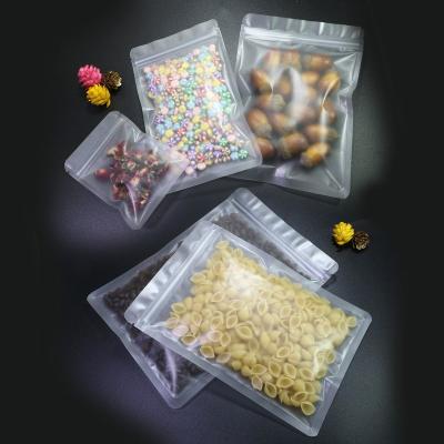 China 100 Rainbow Recyclable Holographic Foil Canister Bags With Clear Window Or Double Sided Color Seal For Candy for sale