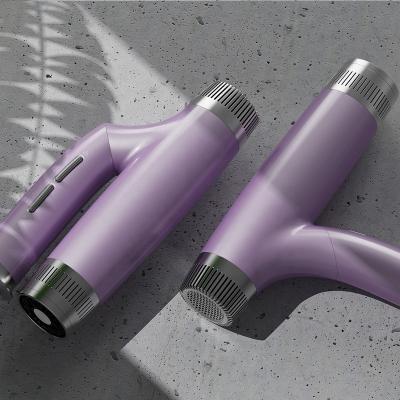 China Foldable High Speed ​​BLDC Reverse Hot Cool Air Motor Compact Light Weight Hair Dryer for sale