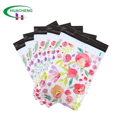 China Custom Printed Apparels Flower Mailing Self Postal Poly Seal Bags Platic Express Shipping Parcels Paper Bags For Clothing for sale