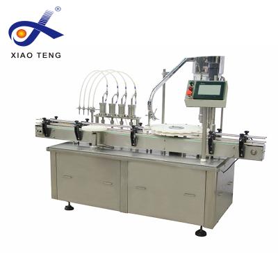 China CLOTHING 5-30ml dropper bottle filling machine, vacuum bottle filling machine, liquid filling machine for sale