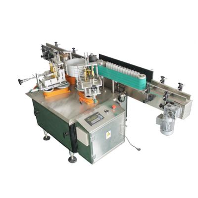 China Semi Automatic Food Condiment Round Glass Bottles Wet Glue Labeling Machine for sale