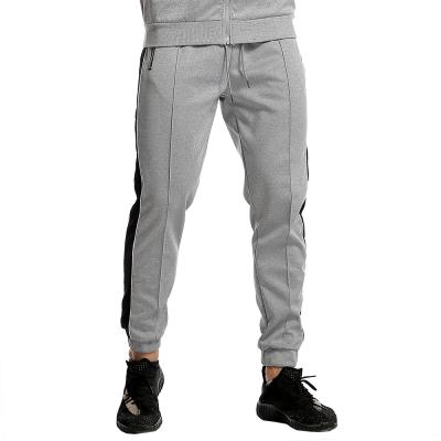 China 2021 Top Rank Men's Stretch Sweatpants QUICK DRY Slim Solid Color GYM Running Jogger Pants Jogging Training Man for sale