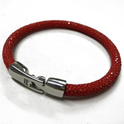 China Magnetic Loop Leather Wristband Cheap Casual / Sporty Stingray Orange Leather Wristband for sale