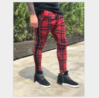 China New European men's breathable pants and American plaid printed pencil pants casual pants men for sale