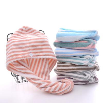 China Custom Coral Fleece Quick Dry Soft Turban Towel With Buttons Hair Towel for sale