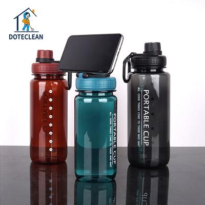 China Eco-Friendly Sustainable 600ml BPA Clear Tritan FREE Gym Drinking Plastic Sports Water Bottle With Cell Phone Bracket for sale