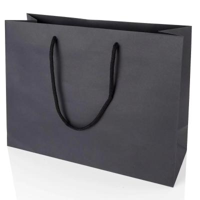 China Recyclable Custom Christmas Kraft Paper Material With Stamping Logo Paper Shopping Bag And Shopping Paper Bag for sale