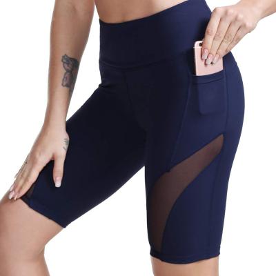 China Custom Breathable Quick Dry Mesh Insert Women Scrunch Butt Running Booty Yoga Shorts Purple Shorts With Pockets for sale