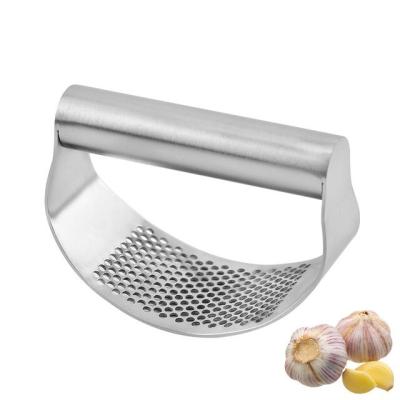 China Amazon Kitchen Tools 2022 Hot Selling Multifunctional Manual Garlic Press Stored Ring Shape Handheld Stainless Steel for sale