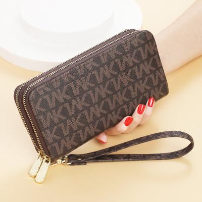 China Hot Sale Waterproof Ladies Clutches Long Wallet With Zipper Mobile Phone Women Cell Phone Purse Leather Case With Wristband Strap for sale