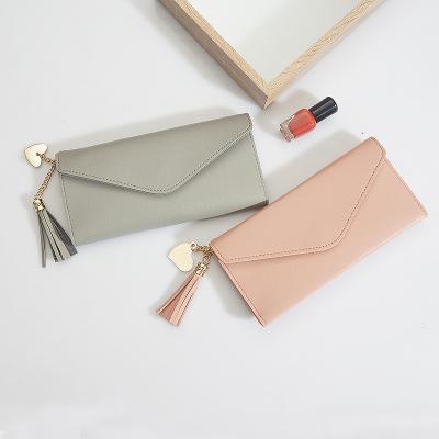 China Waterproof Wallet Ladies PU Leather Wallet Clip Along with Card Slot and Tassel Puller for sale