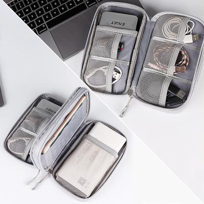 China New Jacquard Mobile Digital Accessories Storage Bag Mouse Data Cable Power Protection Bag, U Disk, Charger Makeup Storage Bag for sale