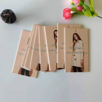 China Sustainable Cheap Security Customized Private Label Coated Logo Paper Hang Tags Plain Clothing Tags for sale