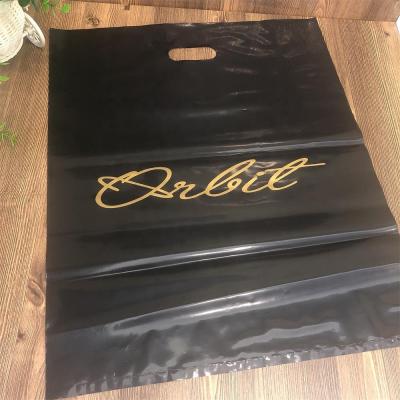 China Recyclable Die Cut Plastic Package Shopping Bags With Golden Logos for sale