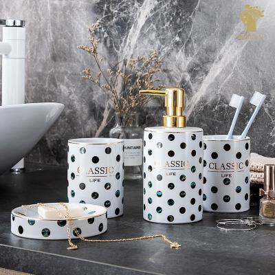 China Sustainable Creative Nordic Ceramic Polka Dot Four-Piece Bathroom Wash Set Hotel Supplies Bathroom Ornaments for sale