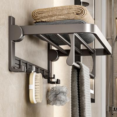 China Matte Black Folding Hook Storage Aluminum Shower Towel Rack Fashion Towel Holder Punch Free Bathroom Accessories for sale