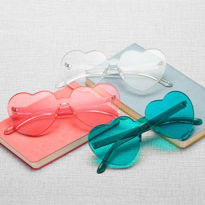 China 2022 Fashion Sunglasses Women's Sunglasses Shades Eco Plastic Heart Rimless Wholesale New Arrival Latest Sunglasses for sale