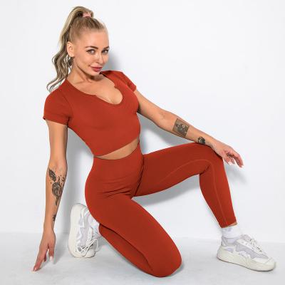 China Manufacturer QUICK DRY New Solid Color Stretch Breathable Comfortable Crop Women Sports Yoga Top Set for sale