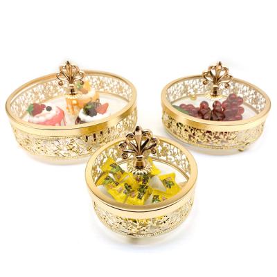 China Golden Candy Jar Wholesale Metal Iron Gold Plated Glass Cake Candy Storage Jars Wholesale With Glass Lid for sale