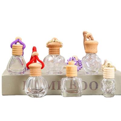 China Refillable Covered Shaped Flower Shaped Skull Shaped Lantern Shaped Perfume Reed Diffuser Glass Bottle 5ml 6ml 8ml 10ml for sale