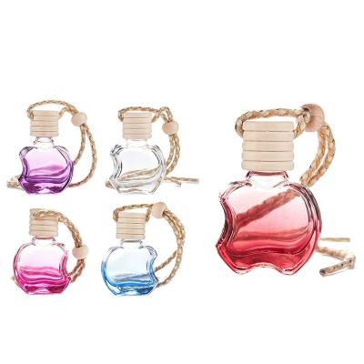 China Customized Colorful Refillable Apple Shaped Glass Car Perfume Packaging Bottle With Screw Lid 5ml 8ml 10ml for sale