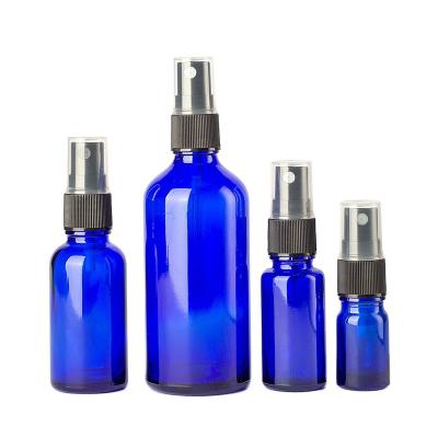 China OEM Cobalt Blue Essential Oil Spray Refillable Glass Bottle 5ml 10ml 15ml 20ml 30ml 50ml 100ml for sale