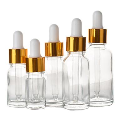 China Cosmetic Essential Oil Matte Transparent Serum Bottle Essential Oil Glass Dropper Bottle With Calibrated Glass Pipette for sale