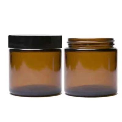 China Glass jar 4oz 70G 100G etc. Cosmetic Amber Glass Black Screw Lid Packaging Candle Jar OEM for sale