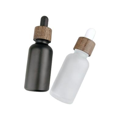 China Real OEM Cosmetic Essential Oil Dropper Wooden Bamboo Plastic Cap With Glass Pipette Straw Inside 18/410 20/410 24/410 for sale