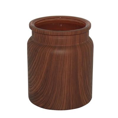 China Stocked Custom Glass Food Storage Containers With Lids 6.5oz Wood Color Candles Scented Glass Jars Water Transfer Glasswares HAODEXIN for sale