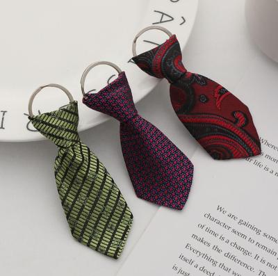 China Free Shipping Key Chain Favor 50pcs/lot Osaka Women Most Popular Mini Tie Chian Key Chain Gift Favors for sale