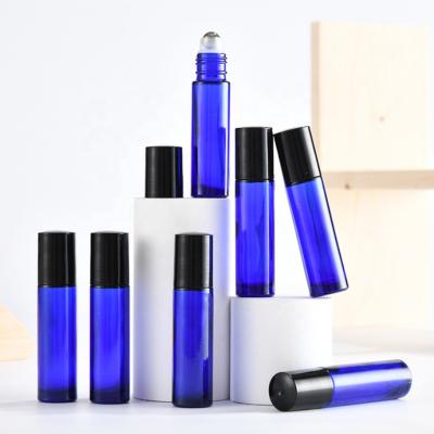 China Household Products 10ml Roll On Violet Slim Blue Color Glass Bottle Custom Packaging Dozen Pcs One Set With Plastic Black Easy Open Lid for sale