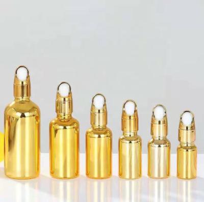 China Personal Care 15ml Make Up Set Skin Cream Toner Plated Gold Glass Bottle 30ml Cosmetic Personal Care Moisturizer High Quality Metal Shiny Pump for sale