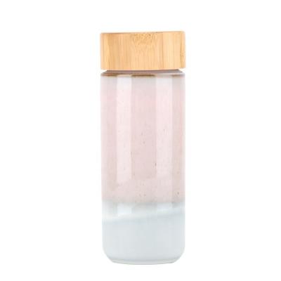 China Sustainable Hot Sales Fashion Design Double Wall Ceramic Water Bottle With Bamboo Lid for sale