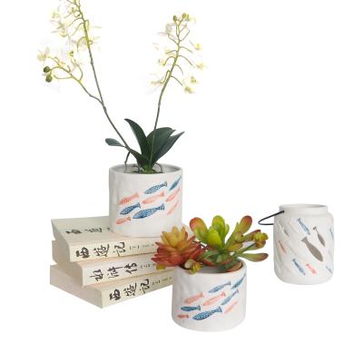 China Bulk Coastal Flower Pots Ceramic Glaze Hollow Can Put Decorative Items Like Grass Flower Pot for sale