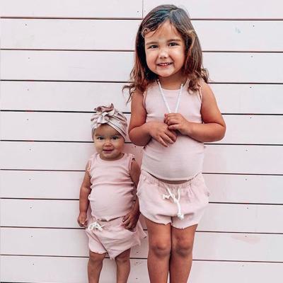 China New Arrival Casual Girls Clothing Sets Sleeveless Shirt And Shorts Set Solid Color Girls Summer Clothing Kids 2 Piece Set Cotton for sale