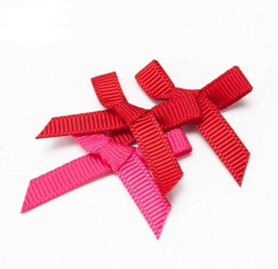 China 2.5cm hand threaded bow multicolor ribbed bow satin for sale