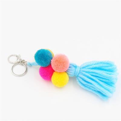 China Bohemia Daily Fashion Wholesale Women's Purse Bag Charm Handmade Tassels Keychains for sale